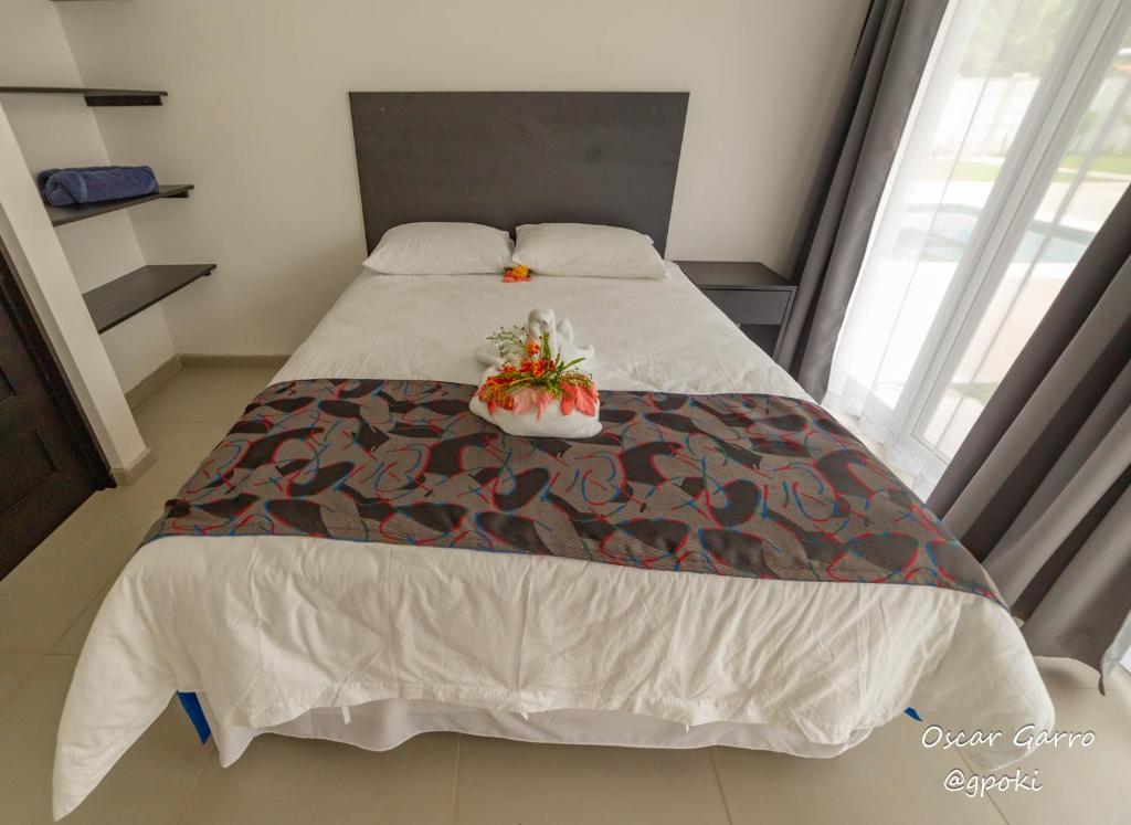 Postel nebo postele na pokoji v ubytování Uvita Paradise