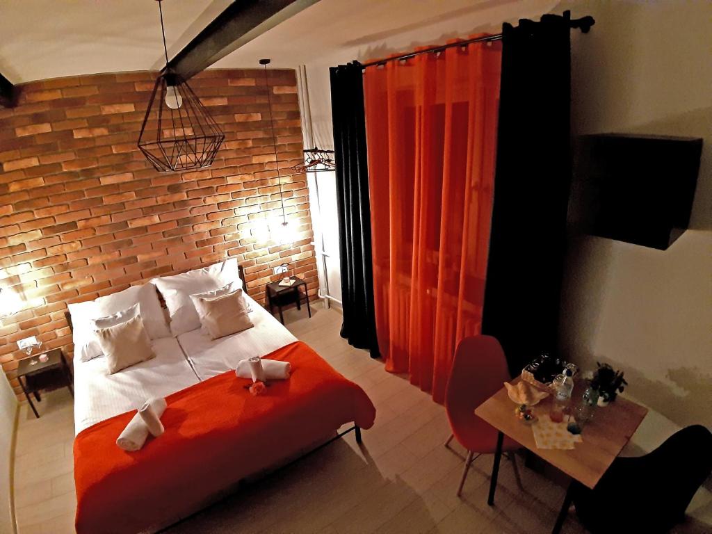 A bed or beds in a room at 4 Kąty Zator Przeciszów