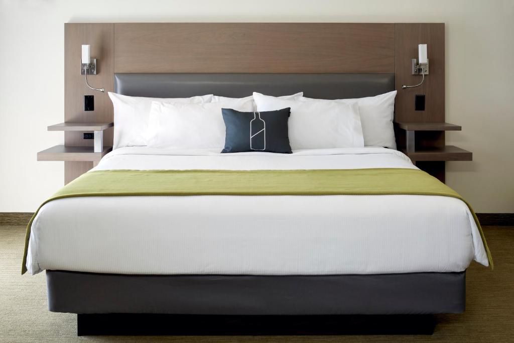 Postelja oz. postelje v sobi nastanitve Hôtel Rive Gauche