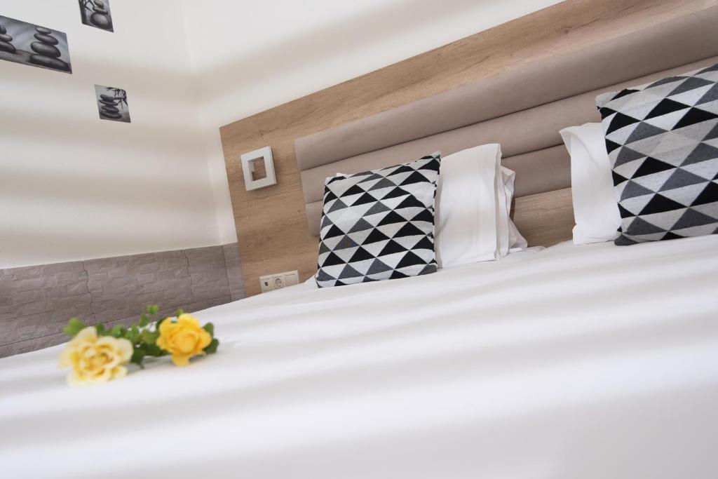 Postel nebo postele na pokoji v ubytování Vagelis Apartments Malia