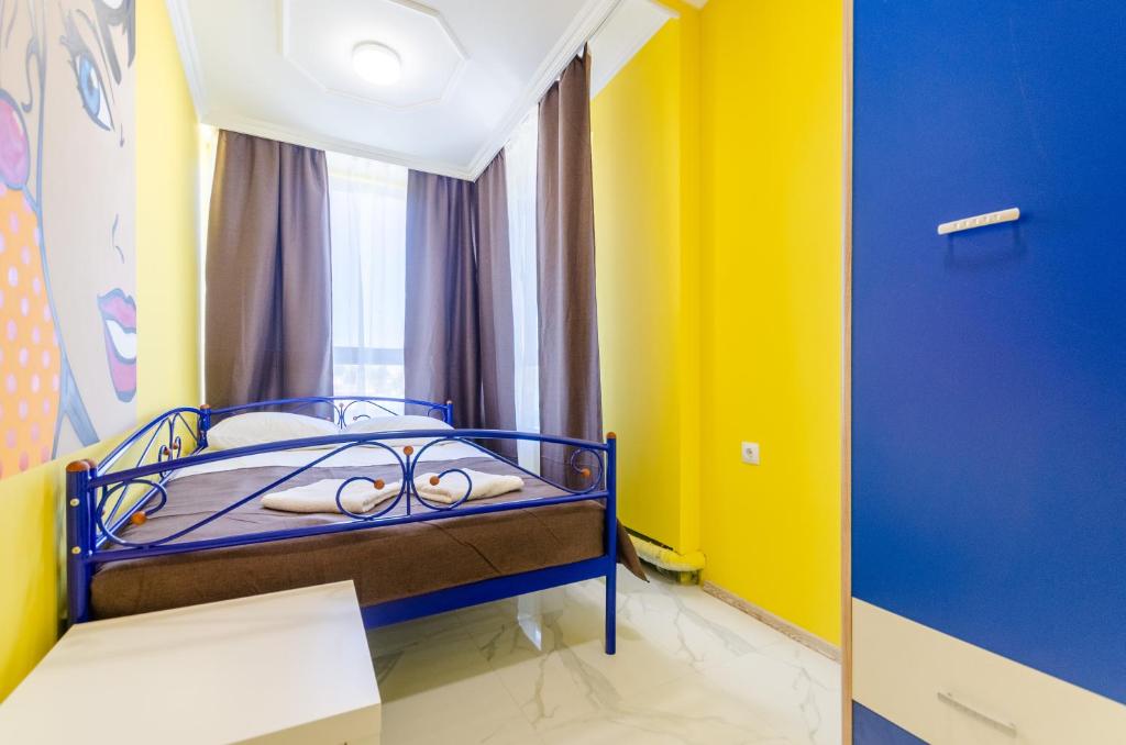 Postel nebo postele na pokoji v ubytování Апартаменты WOW-hotel