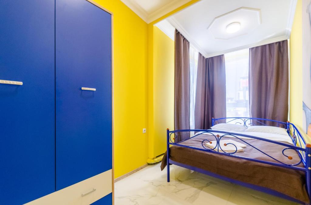 Postel nebo postele na pokoji v ubytování Апартаменты WOW-hotel