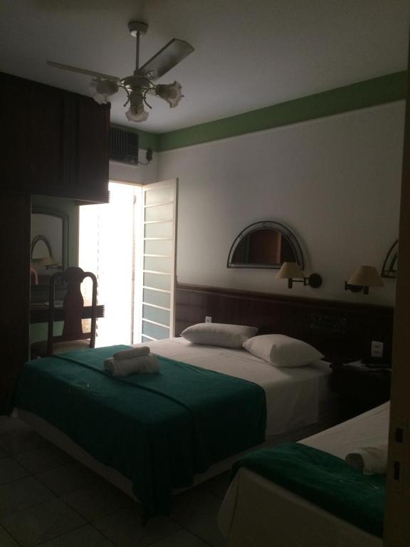 Ein Bett oder Betten in einem Zimmer der Unterkunft Pousada Aguas de Ibira