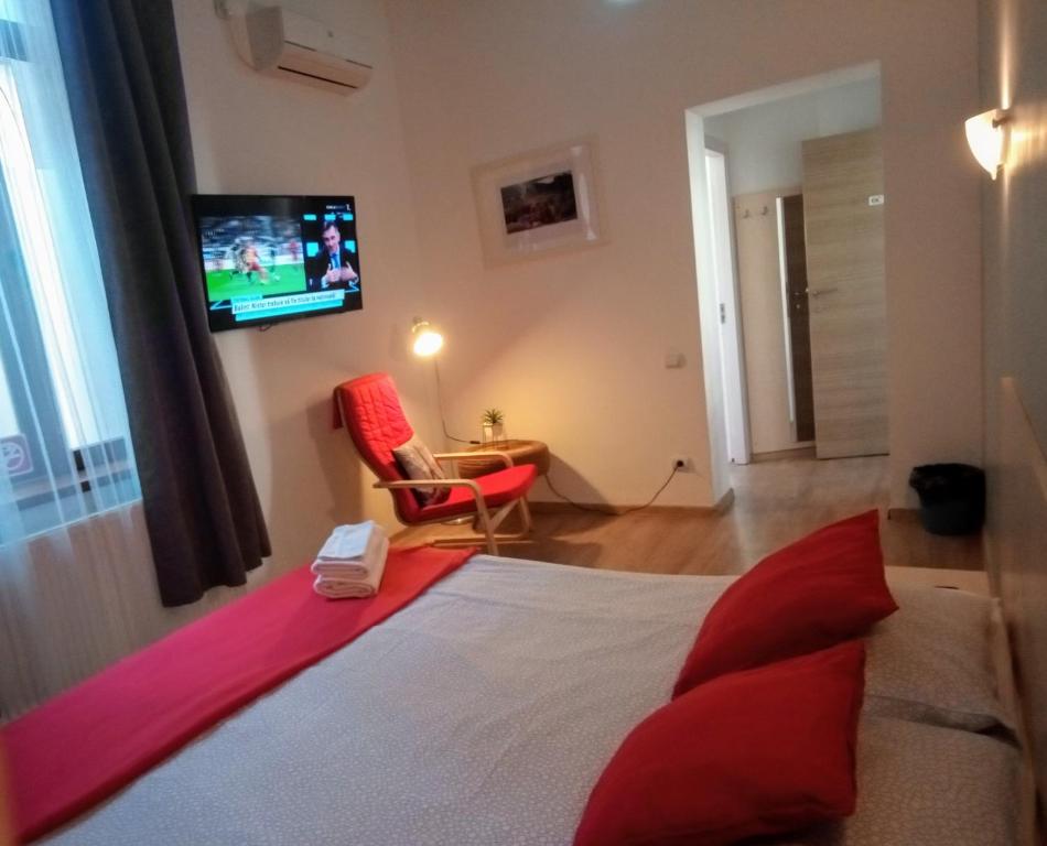 Postel nebo postele na pokoji v ubytování Central Guesthouse