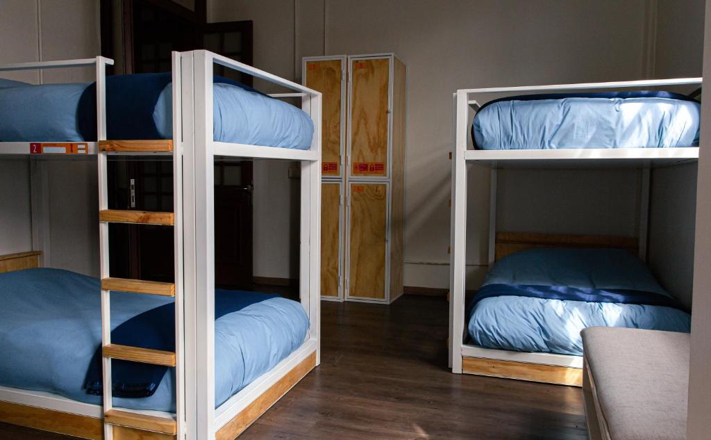 Postel nebo postele na pokoji v ubytování Pariwana Hostel Santiago