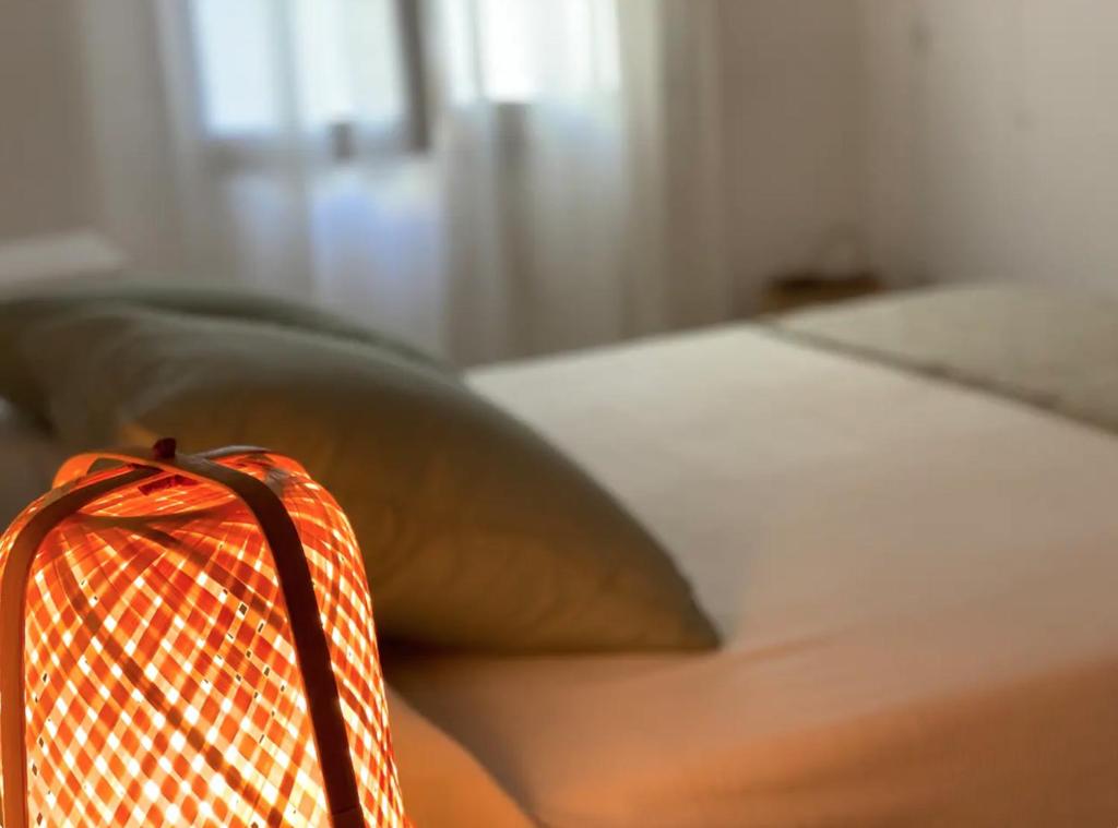 a close up of a pillow on a bed at Can Terrats in Blanes