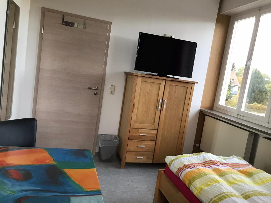Postel nebo postele na pokoji v ubytování Gästehaus Sandra