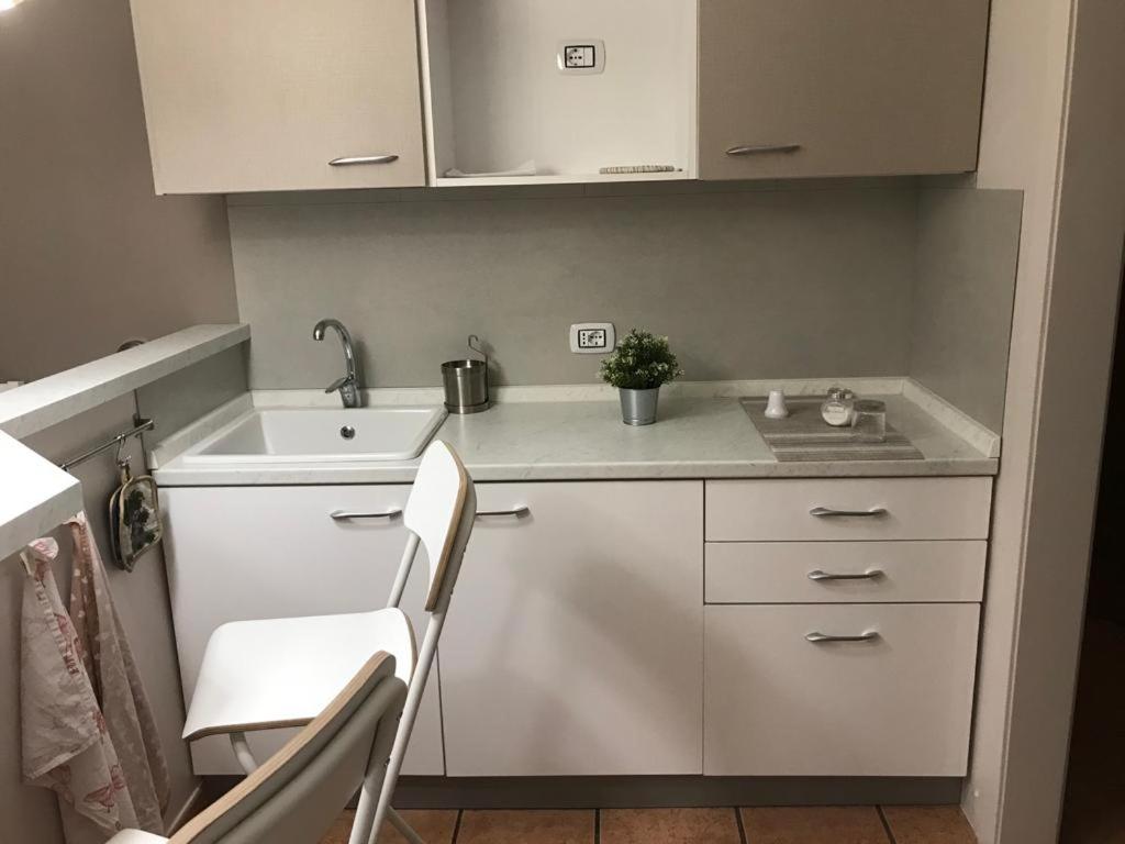 Kuchyň nebo kuchyňský kout v ubytování B&b Cortile Aurora