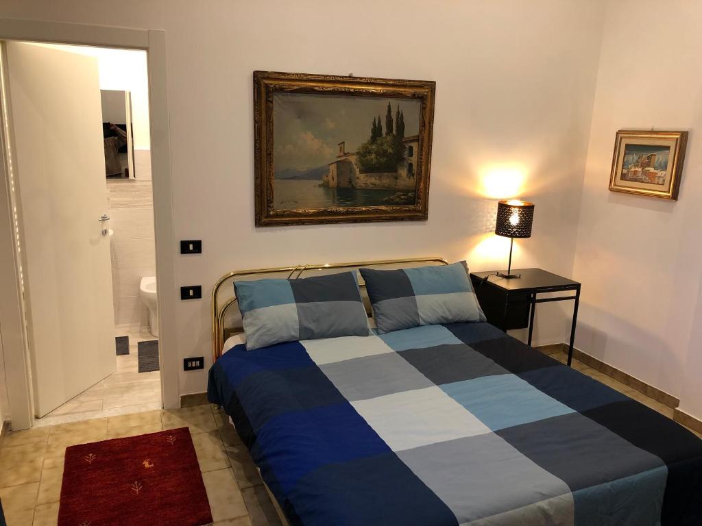 Postel nebo postele na pokoji v ubytování lungomare portoturistico