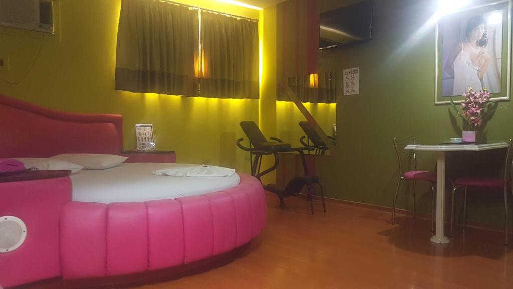 Postel nebo postele na pokoji v ubytování L'acqua Motel Express