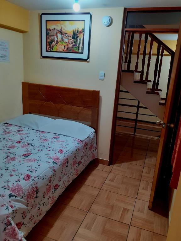 Postel nebo postele na pokoji v ubytování Hostal kuntur cusco