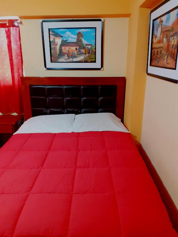 Postel nebo postele na pokoji v ubytování Hostal kuntur cusco