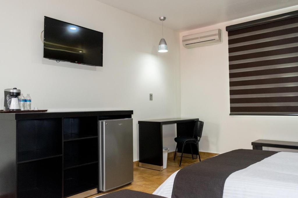 Postel nebo postele na pokoji v ubytování Hotel 5 Inn Plus