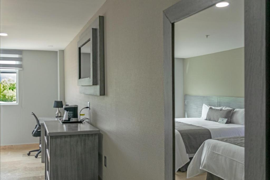 Postel nebo postele na pokoji v ubytování Hotel 5 Inn Plus