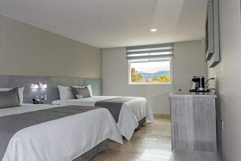 Postel nebo postele na pokoji v ubytování Hotel 5 Inn Plus