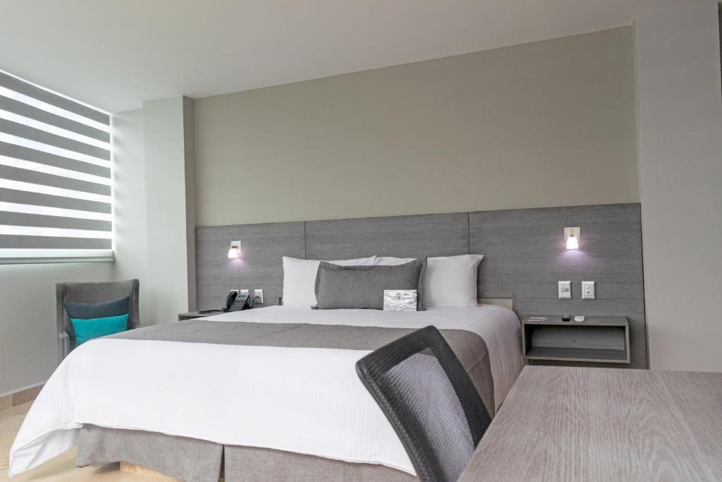Postel nebo postele na pokoji v ubytování Hotel 5 Inn Plus