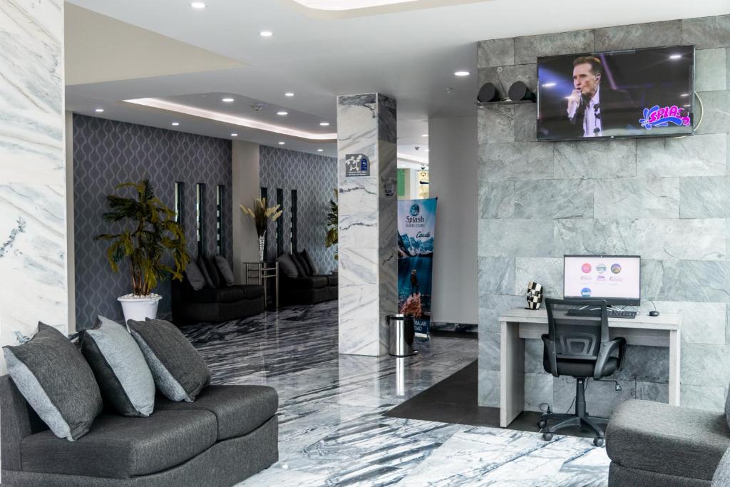 TV a/nebo společenská místnost v ubytování Hotel 5 Inn Plus