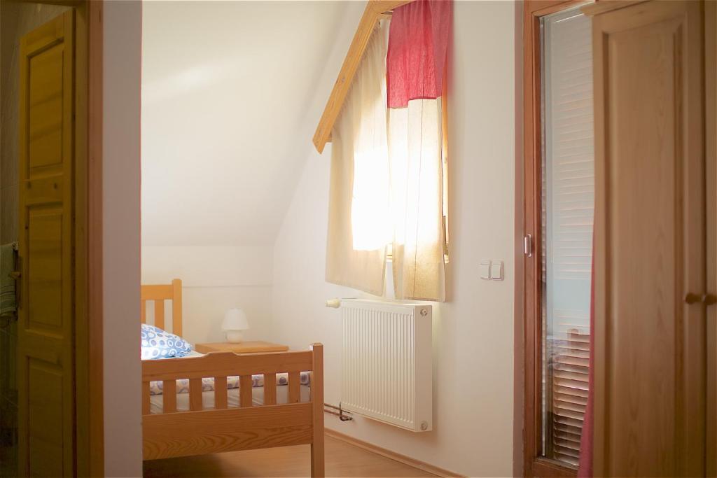 Postel nebo postele na pokoji v ubytování Tourist Farm Rooms Lovrec
