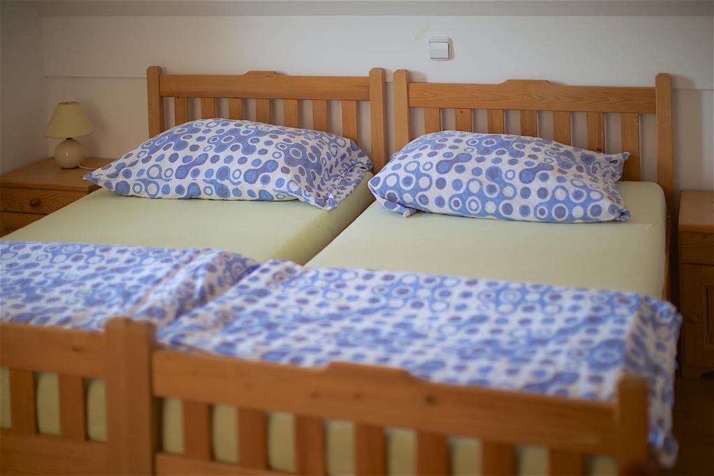 Postel nebo postele na pokoji v ubytování Tourist Farm Rooms Lovrec
