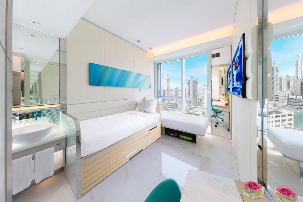 Postel nebo postele na pokoji v ubytování iclub Mong Kok Hotel