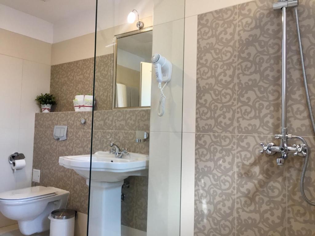 Koupelna v ubytování Family Hotel Agoncev