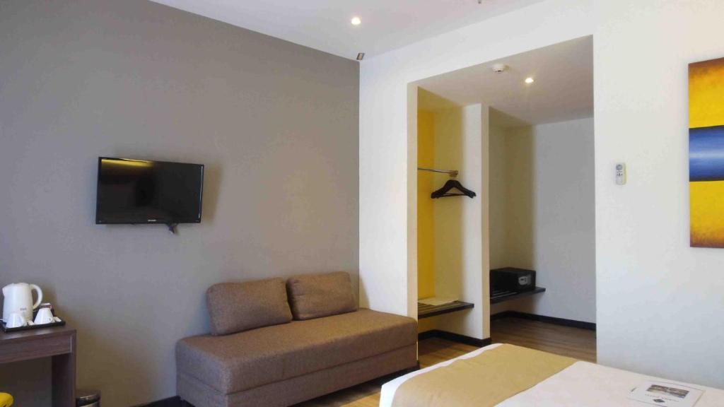 Posezení v ubytování Yunna Hotel Lampung