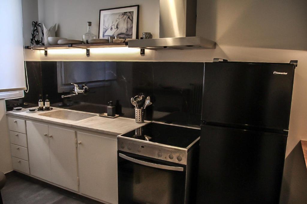 Kuchyňa alebo kuchynka v ubytovaní API Projects Athens - Cartier Apartment