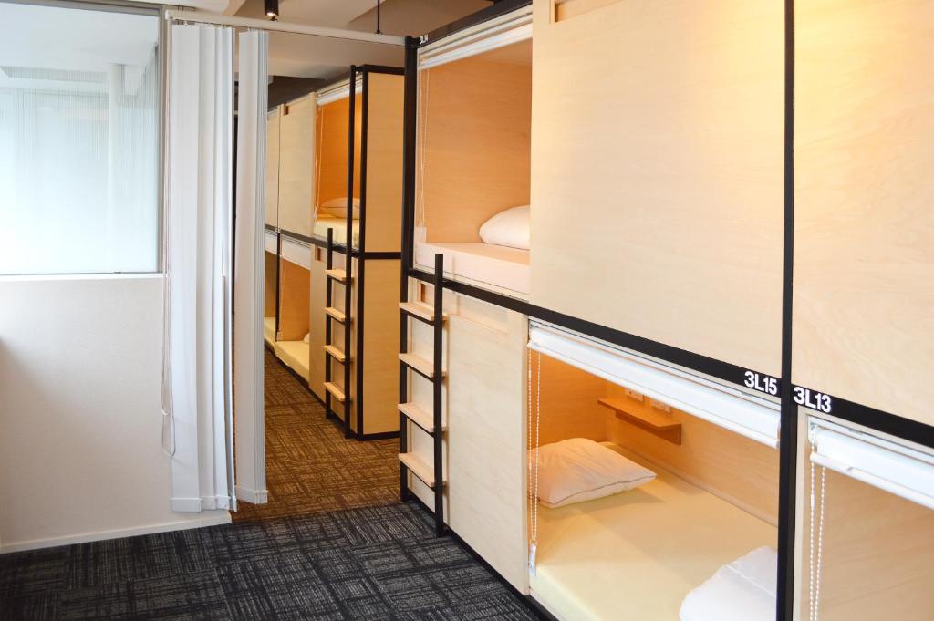 Postel nebo postele na pokoji v ubytování Guest House Tokyo Azabu