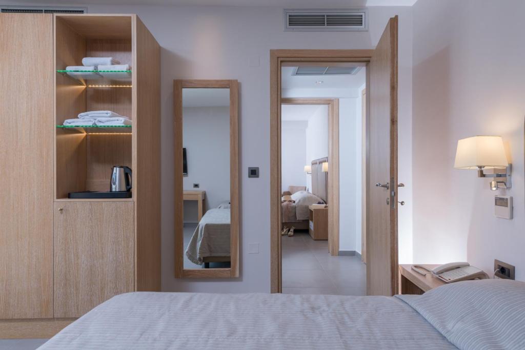 Postel nebo postele na pokoji v ubytování Cactus Beach Hotel