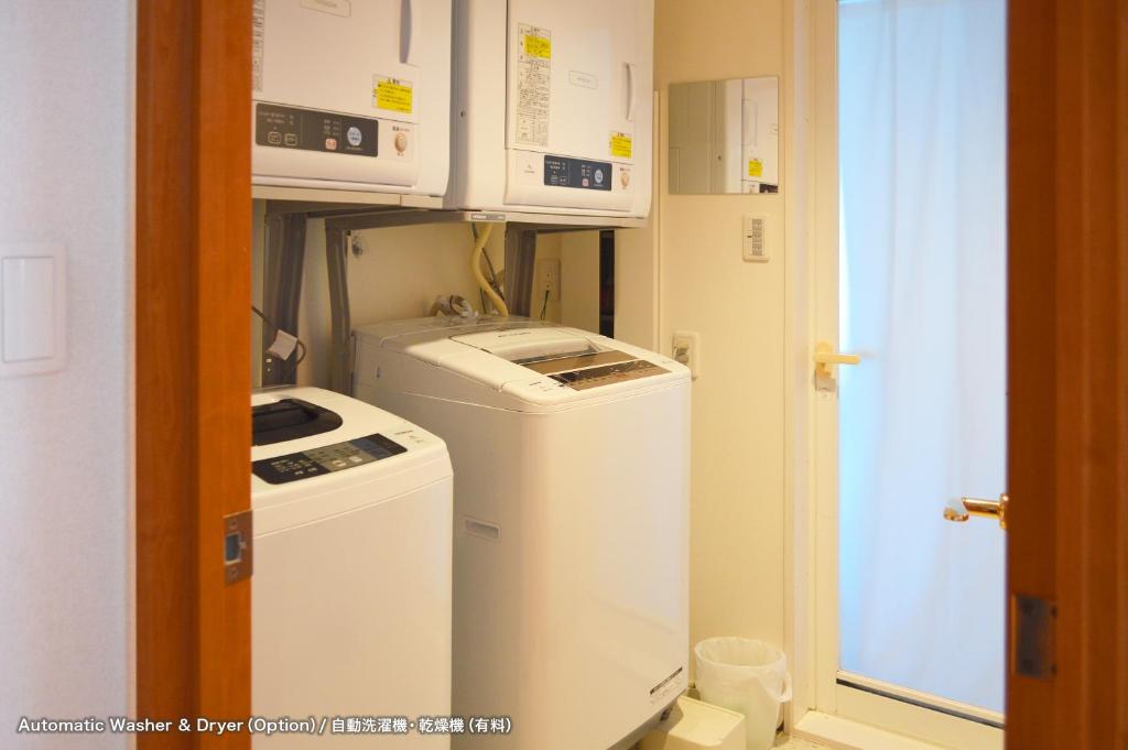 Kuchyň nebo kuchyňský kout v ubytování Guest House Tokyo Azabu