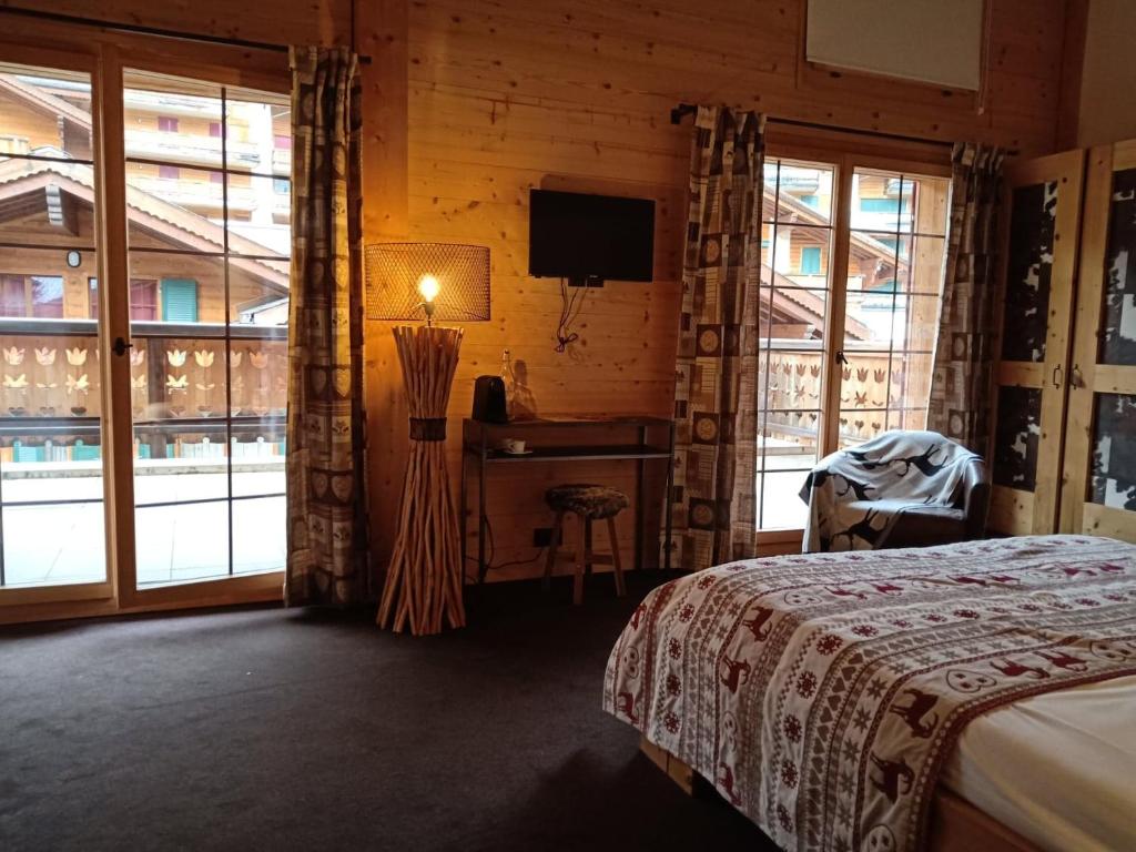 Postel nebo postele na pokoji v ubytování Hotel L'Etable