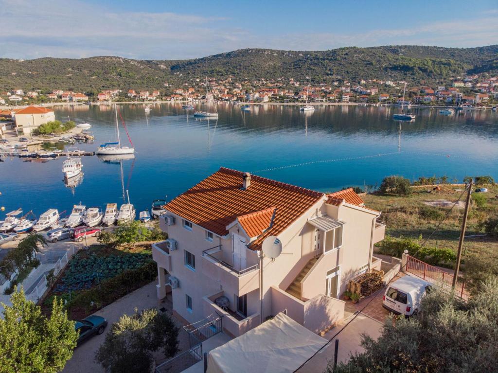 an aerial view of a house with a marina at Apartments Majić in Vinišće
