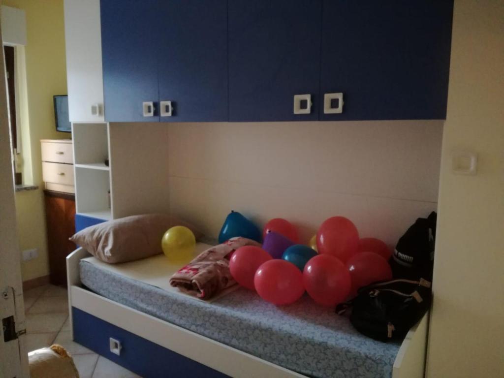 A bed or beds in a room at VILLA ANNAMARIA