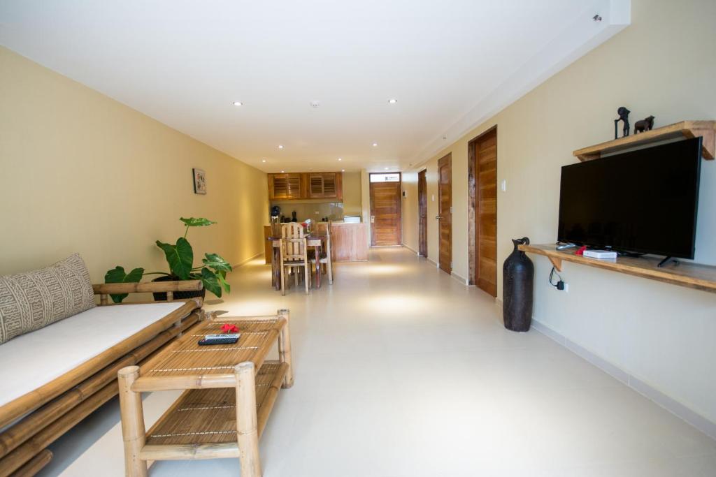 TV a/nebo společenská místnost v ubytování Boracay Amor Apartment