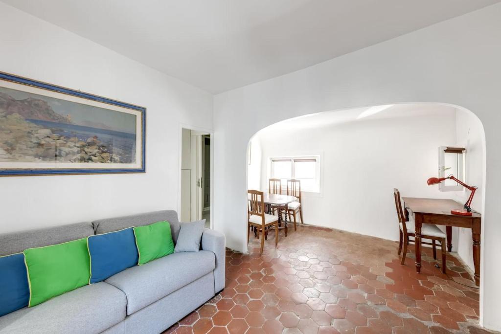 a living room with a couch and a table at Unit 015 Notre Dame (Ursins n°2) in Paris