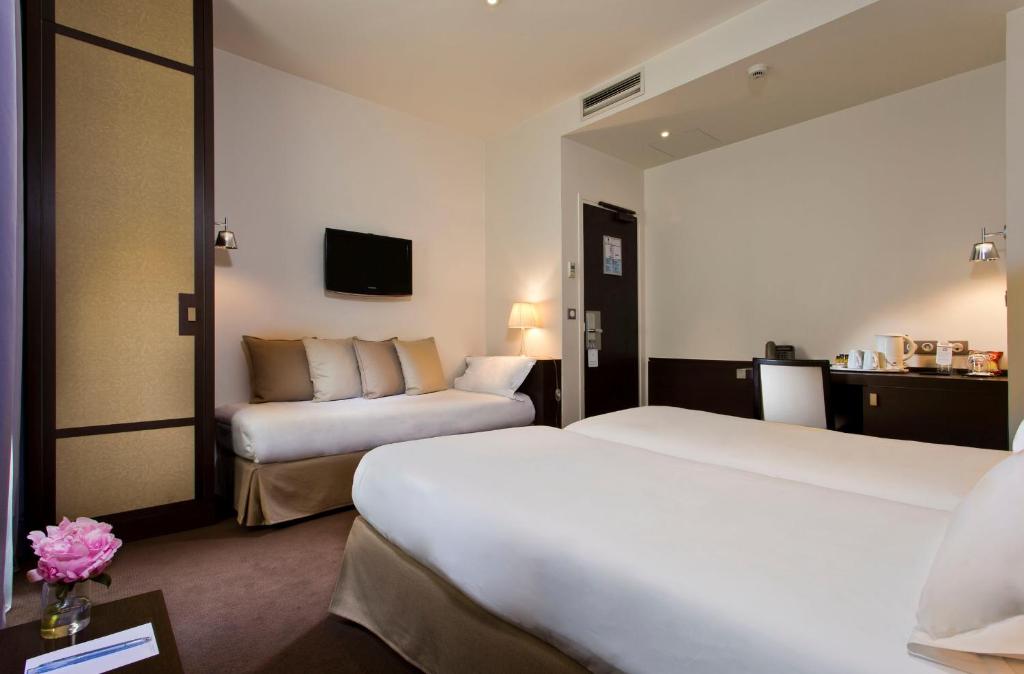 Hôtel Le Colisée - Resim 21