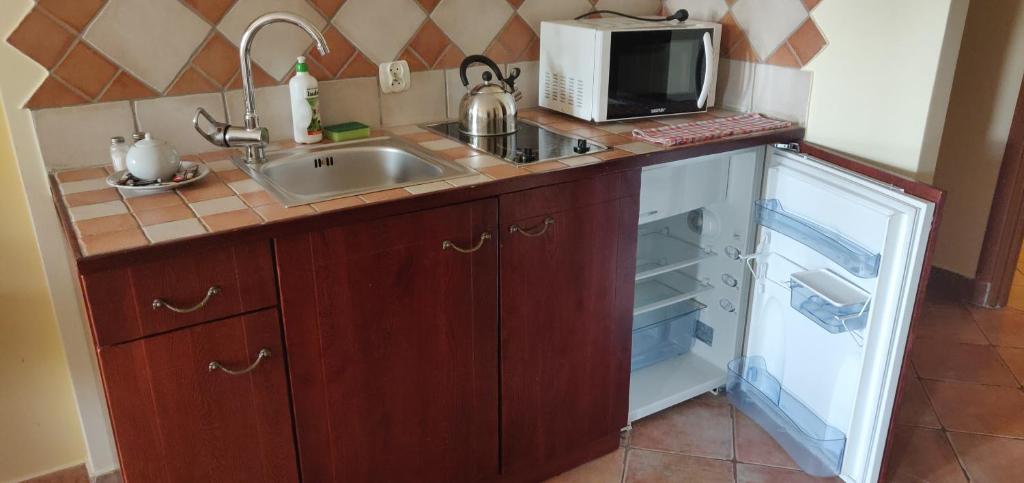Kuchyňa alebo kuchynka v ubytovaní Apartamenty Smętek