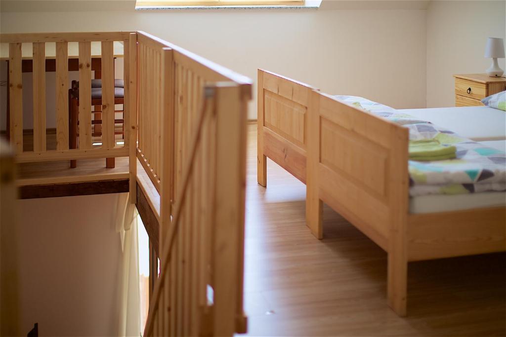 Postel nebo postele na pokoji v ubytování Tourist Farm Apartments Lovrec
