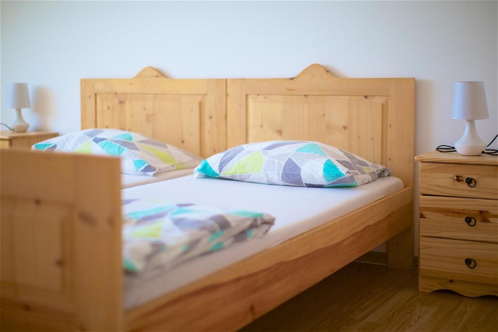 Postel nebo postele na pokoji v ubytování Tourist Farm Apartments Lovrec