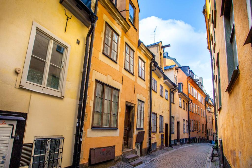 a city street filled with lots of buildings at ApartDirect Gamla Stan in Stockholm