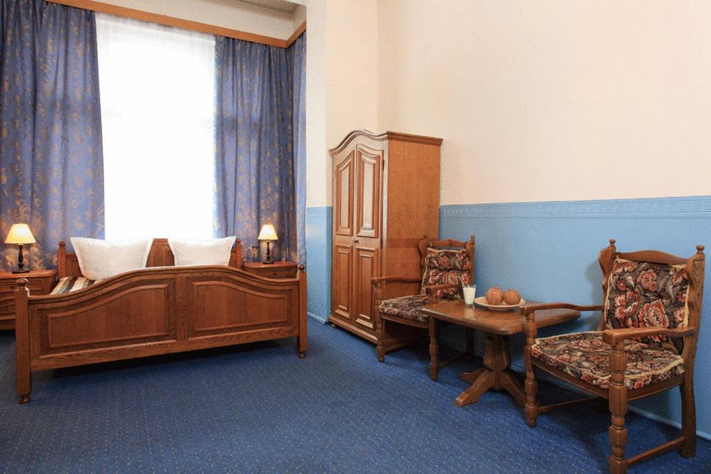 Posezení v ubytování Hotel-Pension Cortina