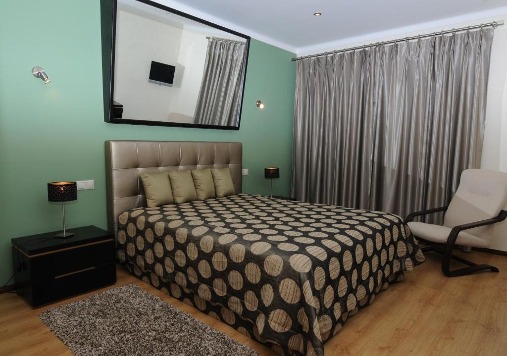 Postel nebo postele na pokoji v ubytování Hotel S. Jorge