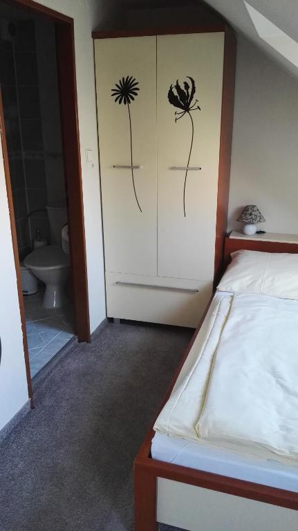 Postel nebo postele na pokoji v ubytování Pension Villa Marit