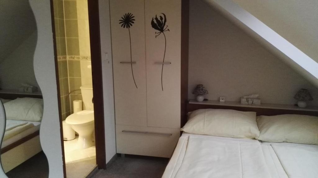 Postel nebo postele na pokoji v ubytování Pension Villa Marit