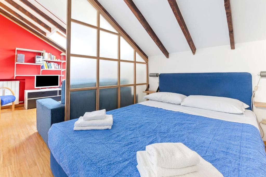 Posteľ alebo postele v izbe v ubytovaní Piazza Risorgimento Cosy Studio