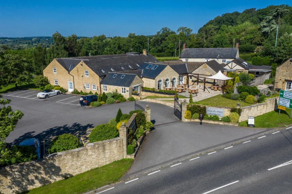 an aerial view of a house with a parking lot at Number Four at Stow - FULLY AIR CONDITIONED in Stow on the Wold