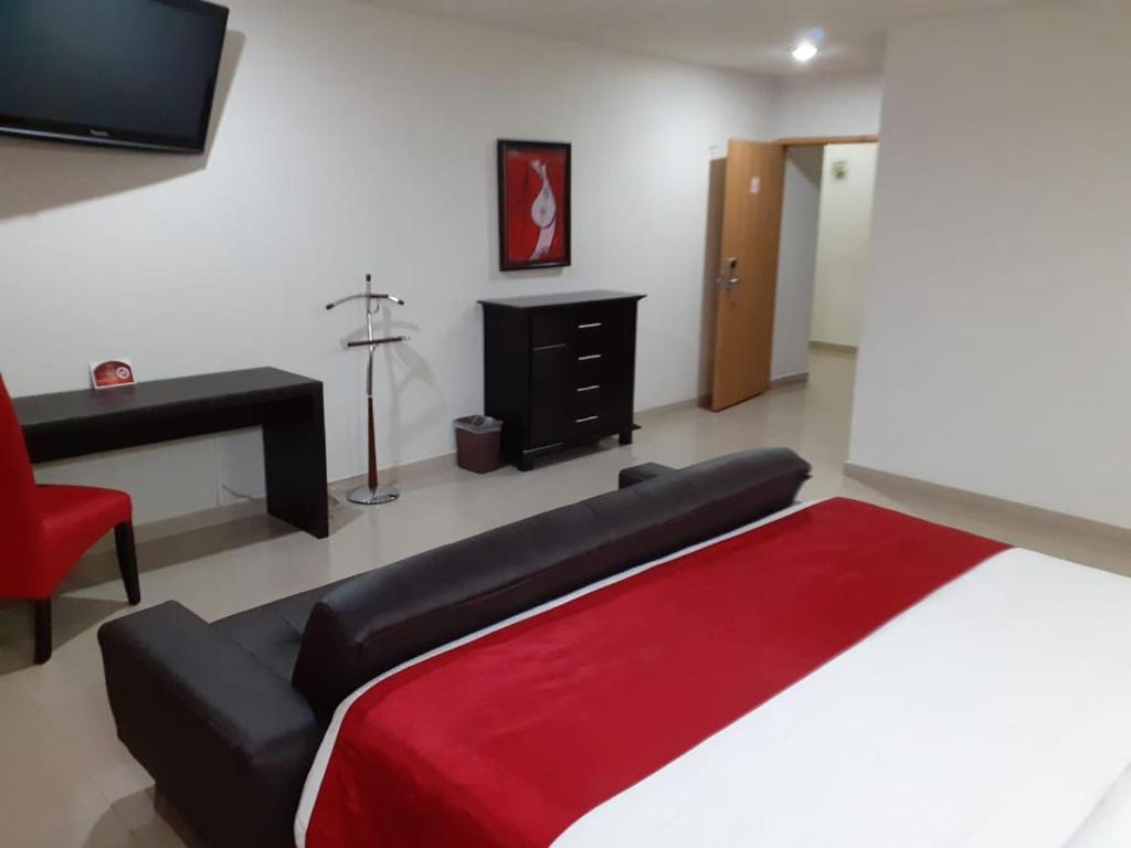 Postel nebo postele na pokoji v ubytování Hotel CEO