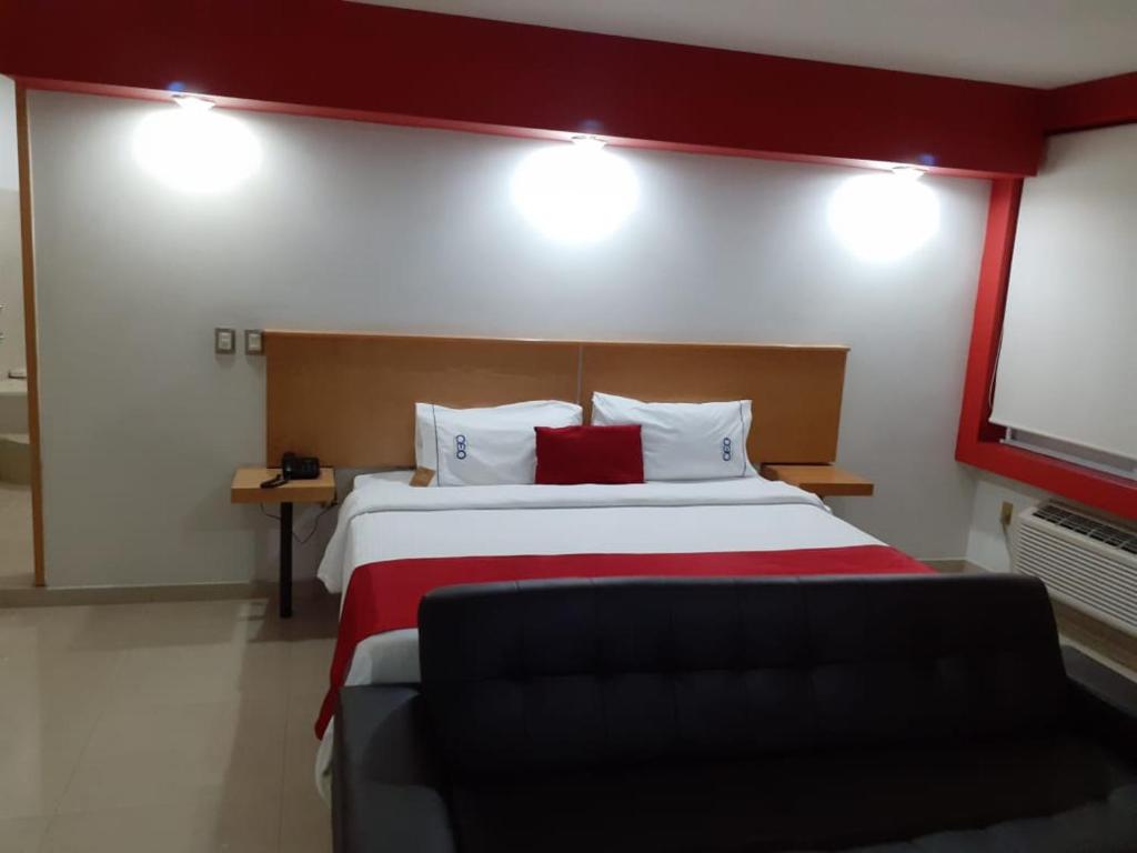 Postel nebo postele na pokoji v ubytování Hotel CEO