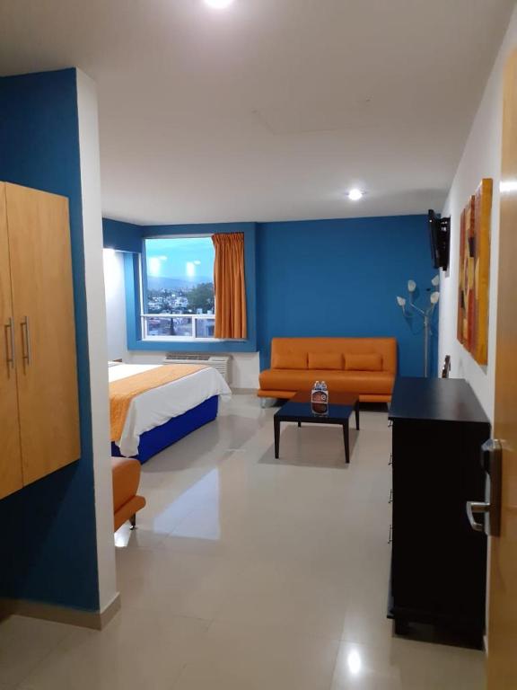 Postel nebo postele na pokoji v ubytování Hotel CEO