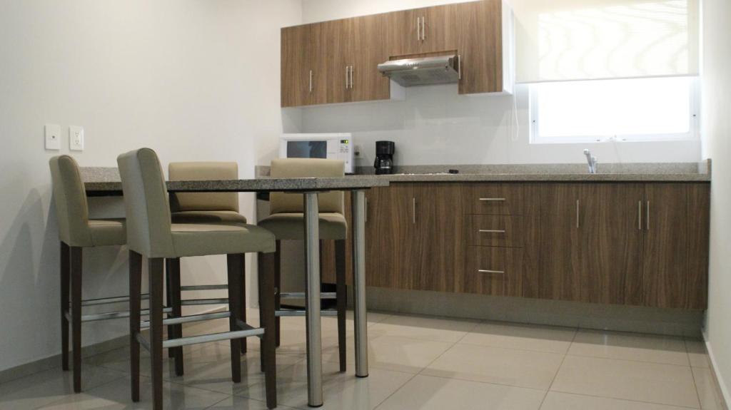 Kuchyň nebo kuchyňský kout v ubytování Suites Chapultepec